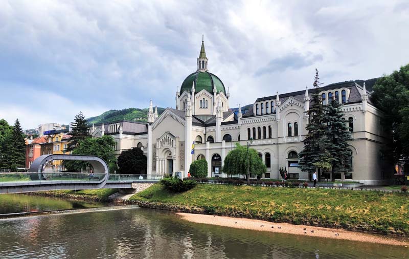 white building with green dome