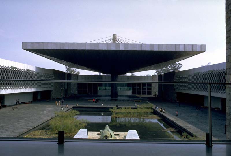 reflecting pool in center of modern courtyard