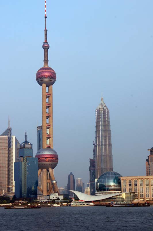 radio tower with city skyline